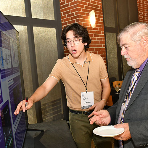 Student presenting project at President's Reception